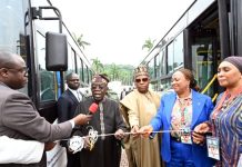 Tinubu unveils CNG buses in Abuja